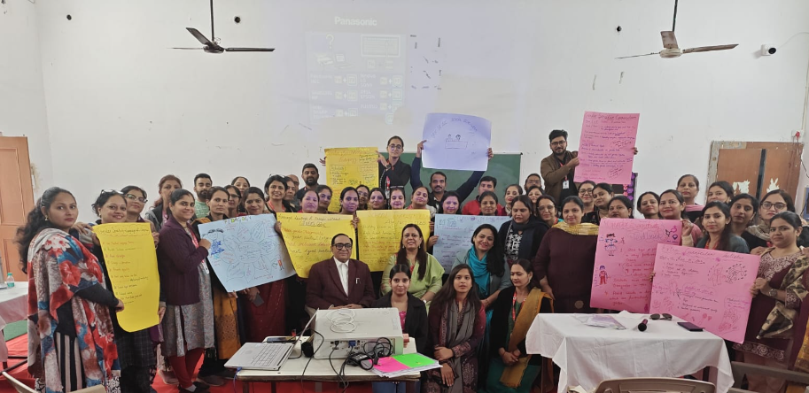 Teachers holding chart-paper reflections