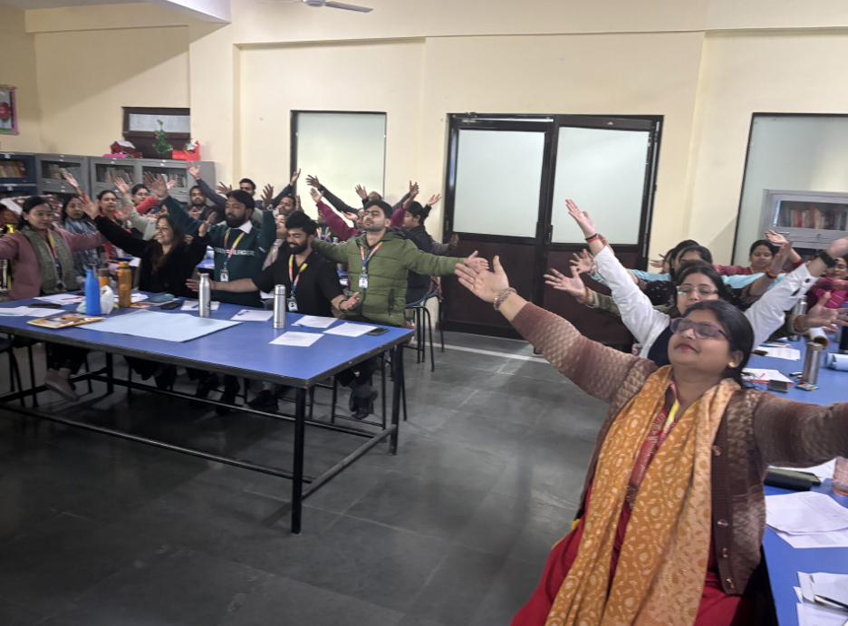 Teachers stretching during a session